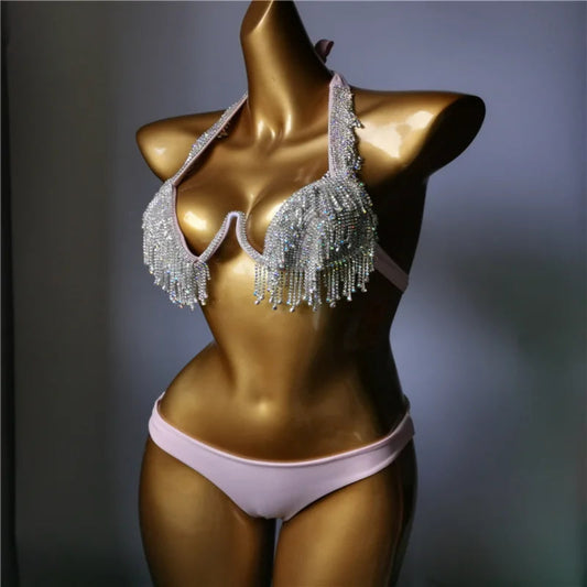 Side angle of rhinestone bikini showing diamond fringe detail and shimmering movement.