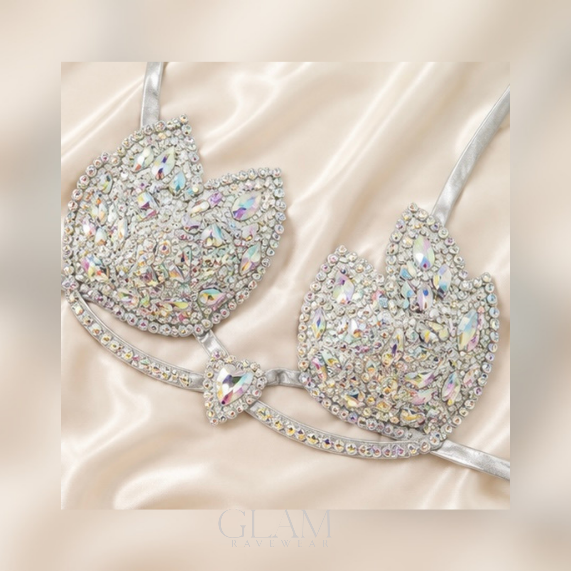 Silver Diamond Dreams rhinestone festival bikini top shown in a flat lay with shimmering crystal embellishments, boutique styling, and luxury GLAM Ravewear aesthetic.
